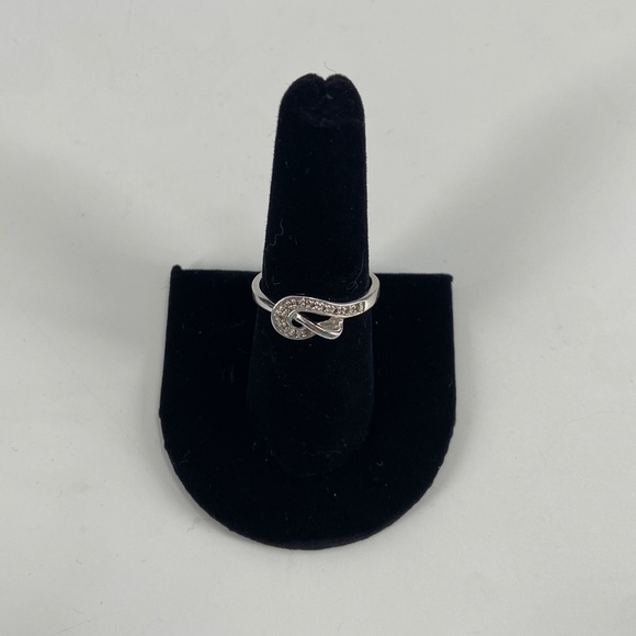 Lia Sophia Jewelry - Lia Sophia silver tone knot ring
